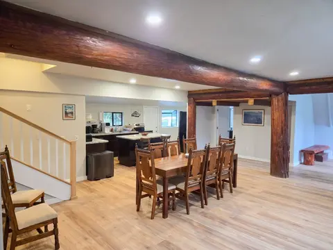 Spacious seating surrounded by gorgeous vintage lumber. Bathe in the cabin aesthetic while your family eats, laughs, and enjoys each other's company. Break out the playing cards or board games to have a great night of family fun.